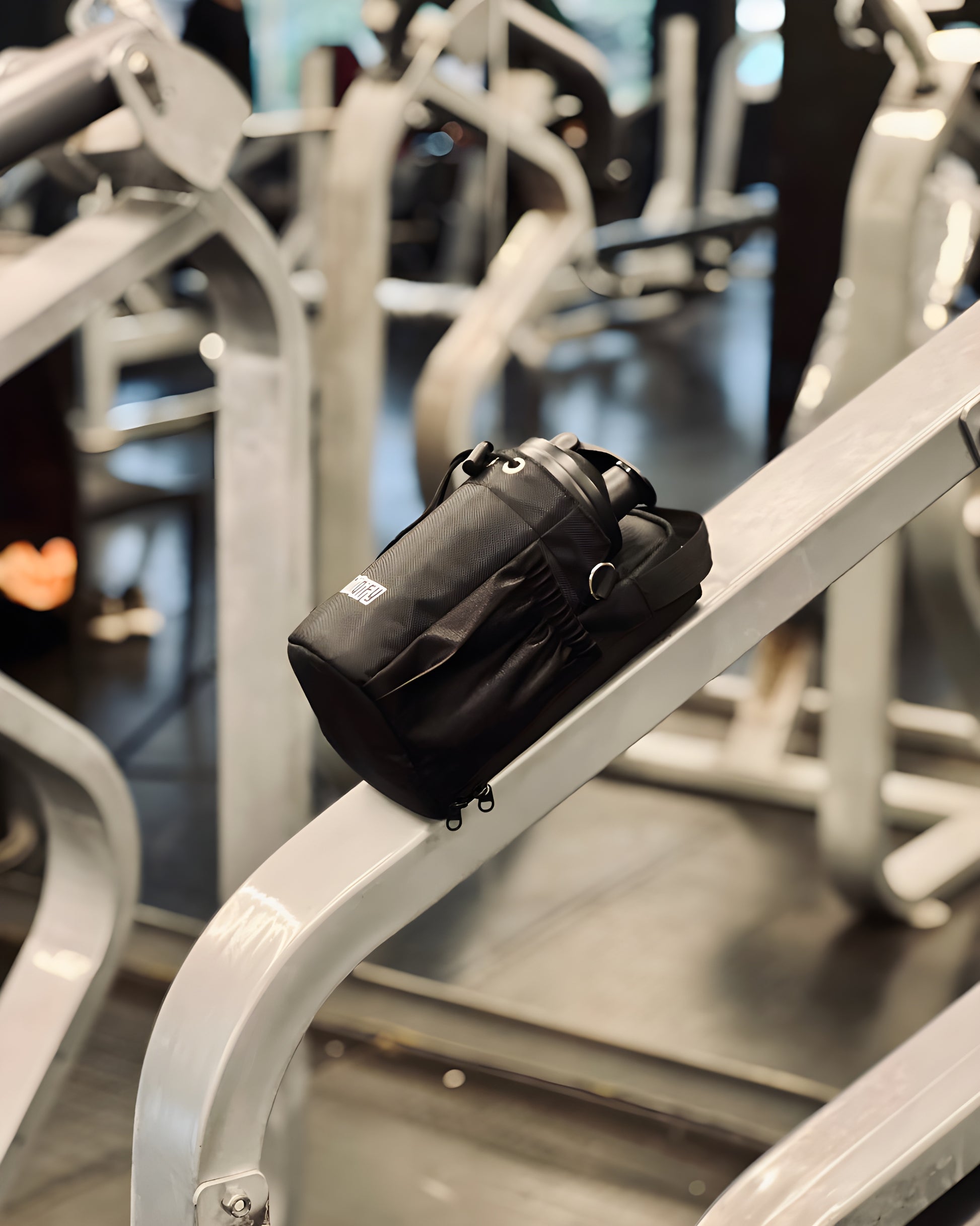 Compact fitness accessory bag with magnets, Hiipack attaches to metal gym equipment for easy access to essentials